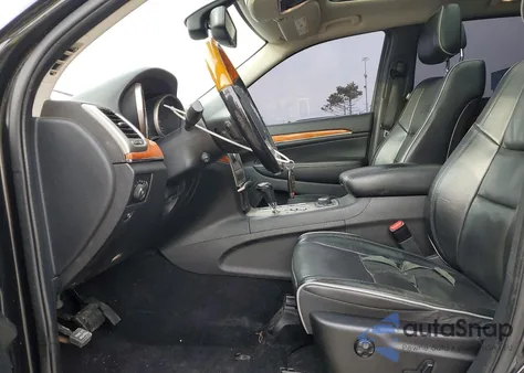 2012 Jeep Grand Cherokee Overland z USA, uszkodzony, nr VIN 1C4RJFCT4CC141606